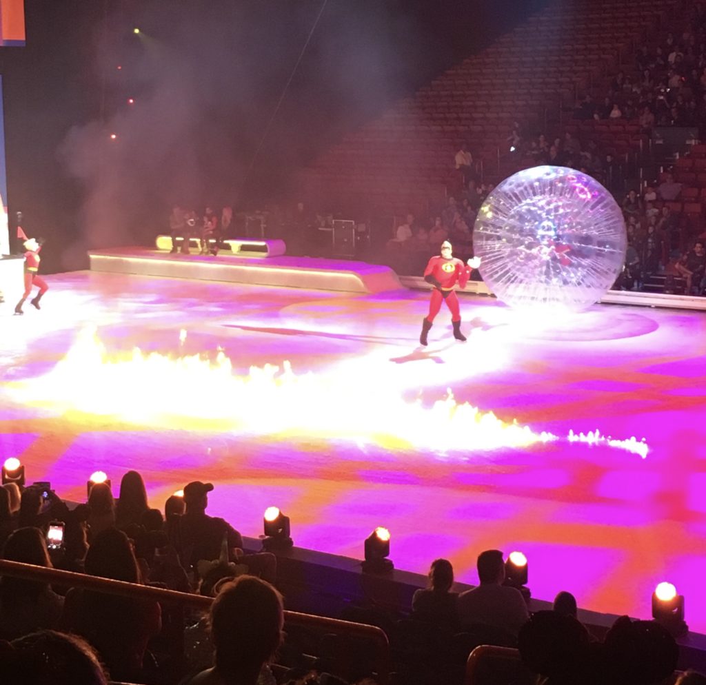 The Incredibles family lights a fire at Disney On Ice presents Road Trip Adventures